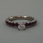 Nr. 167, 750/000 Weißgold, 25+1 Rhodolith (grape) u. Brillant TW/SI-PI (2,5+4,18 mm, 2,25+0,275 ct), Fishtail/Chaton