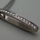 Nr. 22, 750/000 Weißgold, 17 Brillanten TW/VVSI-VSI (1,6 mm, 0,244 ct), Fadenfassung